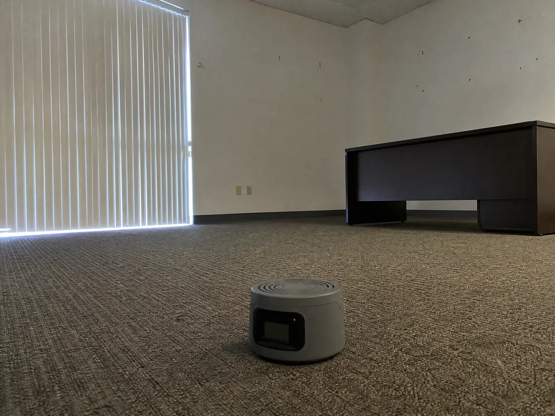 Continuous radon monitor deployed on the floor of a Los Angeles commercial building for testing