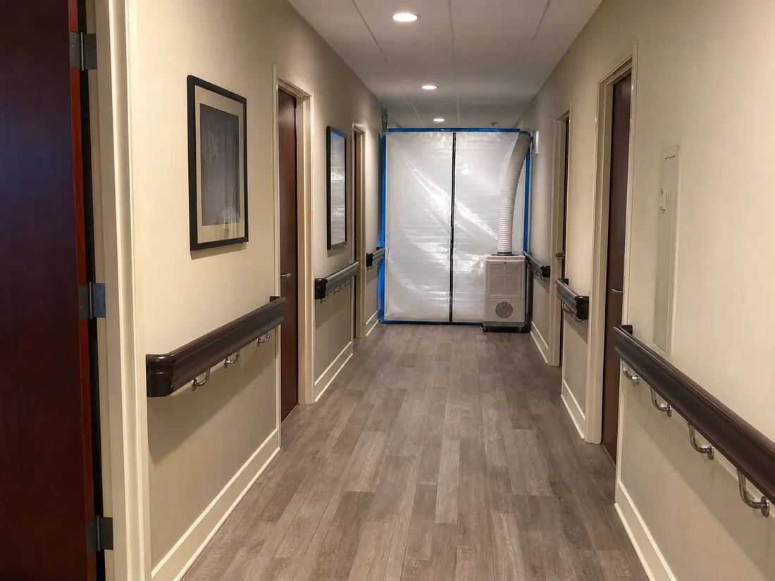 Corridor of a Los Angeles senior living facility where radon mitigation piping is concealed